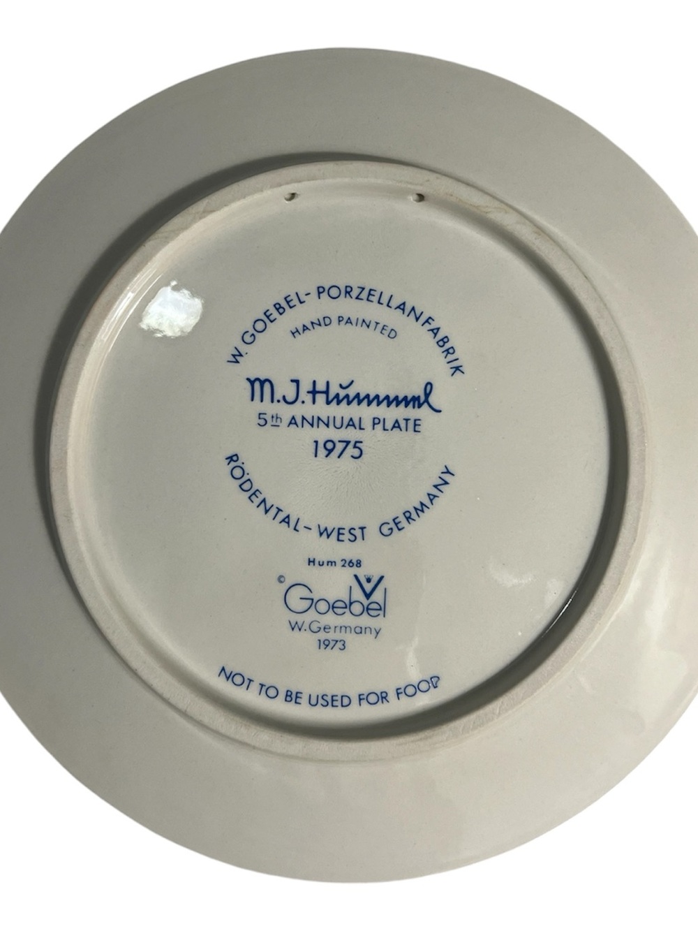 Goebel White Porcelain Decorative Plate with Blue Markings. Hummel 1975
